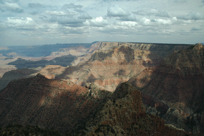 The late afternoon light paints a dramatic portrait of Grand Canyon