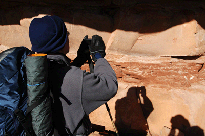 Dennis photographing pictographs