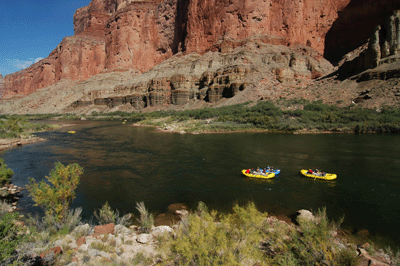 A river party floats down the Colorado River