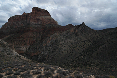 Ominous Kwagunt Butte dominates the horizon during my hike into Malgosa Canyon