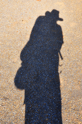 Self portrait of a shadowy hiker