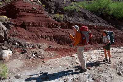 Chris (left) and Rob discuss the geology of Lava Creek Canyon