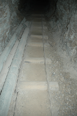 Rails along the floor of the main shaft