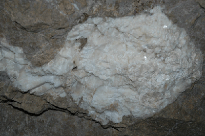 A white crystaline mineral in the ceiling