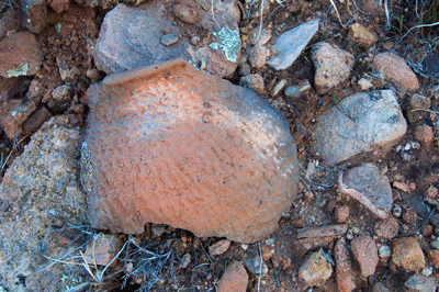 A large potsherd hints at the ancestral Puebloan community that once called this valley, home