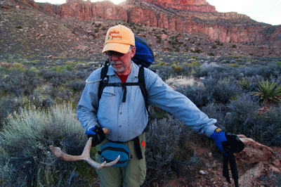 Dennis holds an antler found along the descent into Chuar Valley