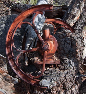 A close up view of the Elgin National coffee mill at the Still Spring site along Lava Creek