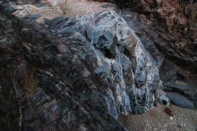 The schist pour-off where the east arm of Trinity Creek joins the main arm of the canyon